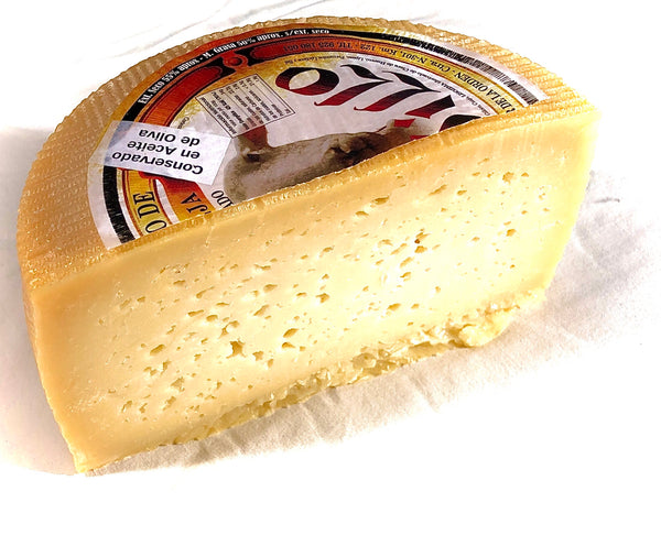 Medio queso curado de oveja en aceite 1.5kg aprox